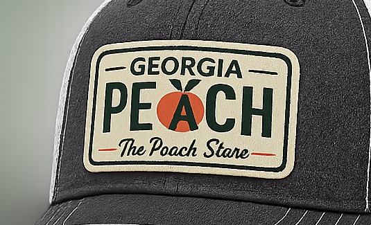 Macro close-up of the embroidered Georgia Peach patch