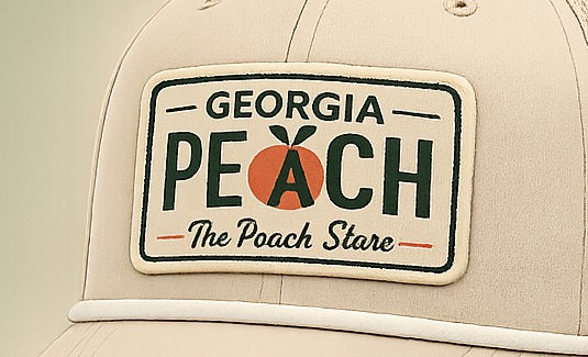 Macro close-up of the embroidered Georgia Peach patch