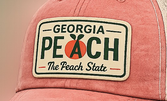 Macro close-up of the embroidered Georgia Peach patch