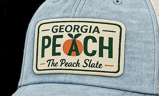 Macro close-up of the embroidered Georgia Peach patch